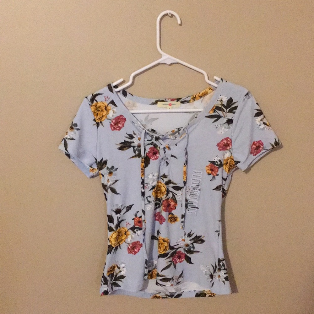 Cute floral Tee. Laced tie in front! Wishful park!